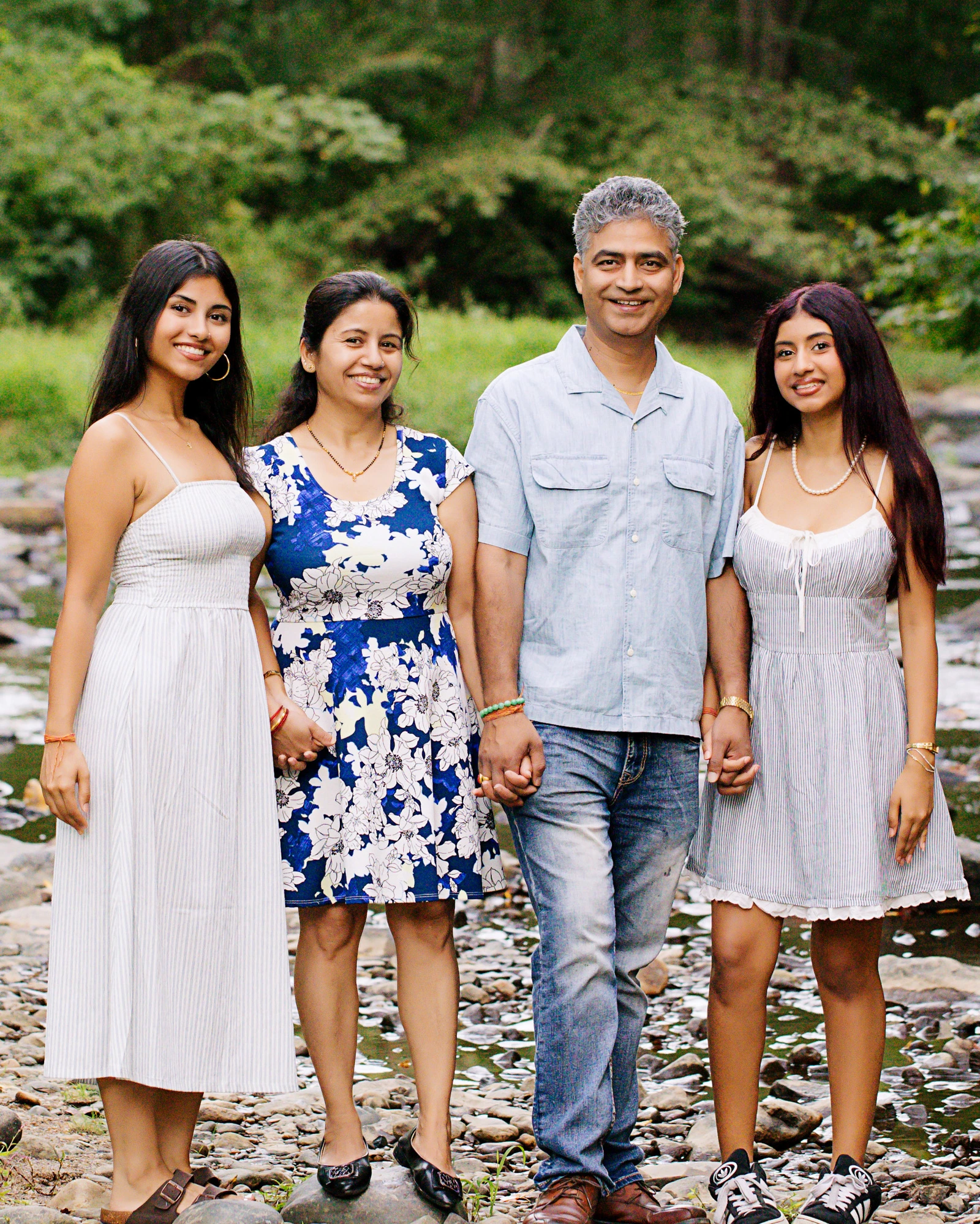 Satish Chapagain with his wife and daughters